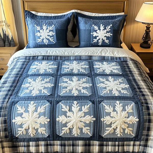 Snowfall Serenity quilted 3-piece bedding set on a made bed with two matching pillow shams