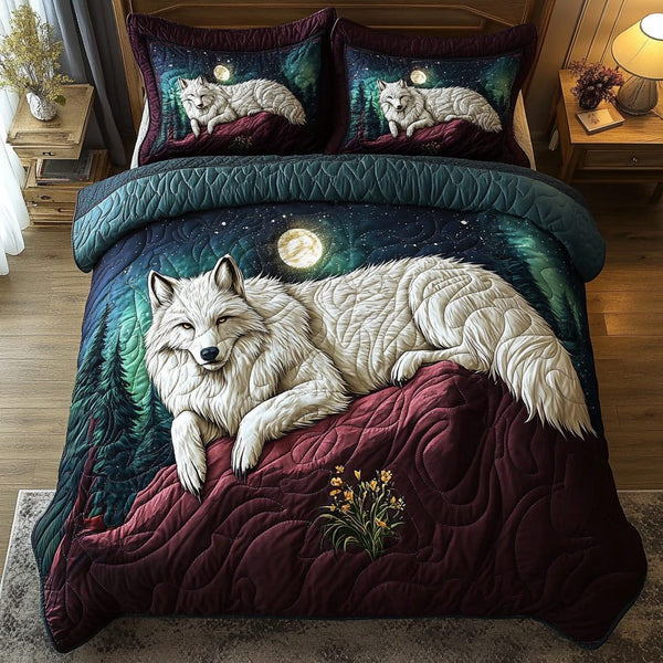 Snowfang quilted 3-piece bedding set on a made bed with two matching pillow shams