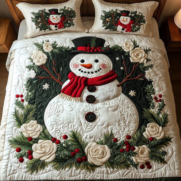 Snowland Bliss quilted 3-piece bedding set on a made bed with two matching pillow shams
