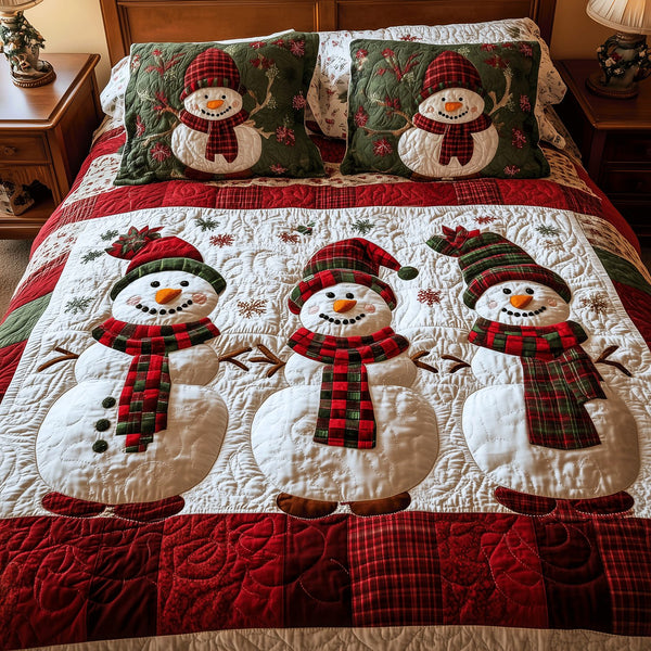 Snowman Wonderland quilted 3-piece bedding set on a made bed in a winter-styled bedroom