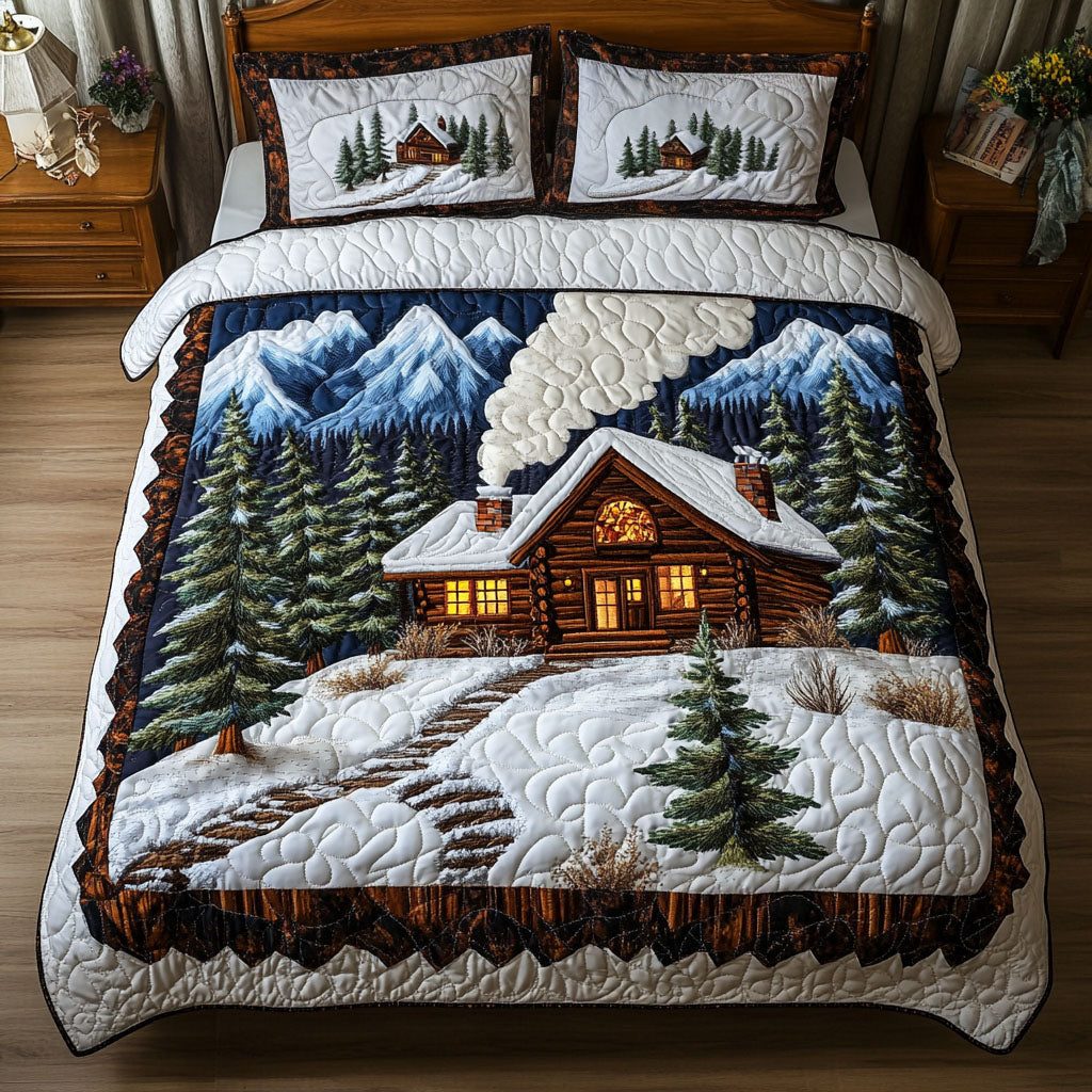 Snowy Cabin Evening quilted 3-piece bedding set on a made bed with two matching pillow shams