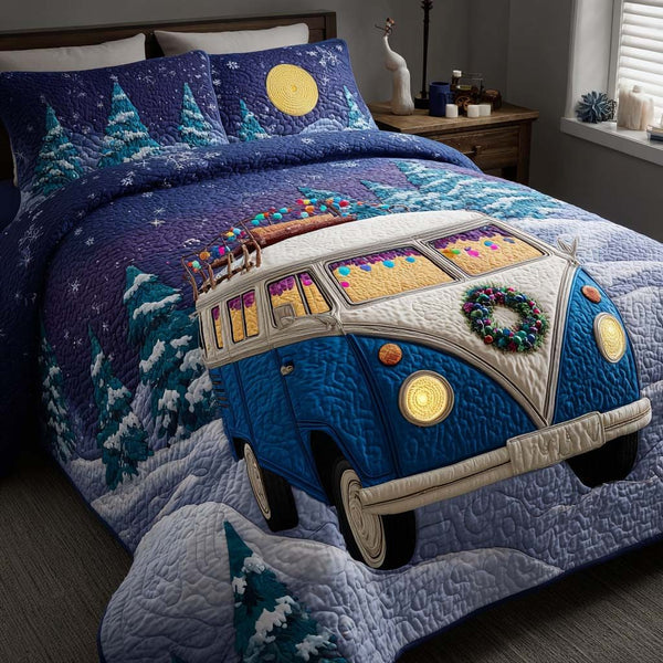 Snowy Camp Dreams quilted 3-piece bedding set on a made bed with two matching pillow shams