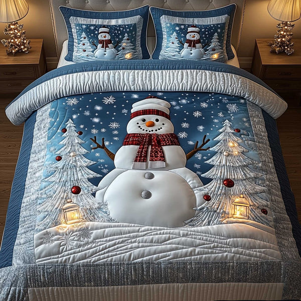 Snowy Companions quilted 3-piece bedding set on a made bed with two matching pillow shams