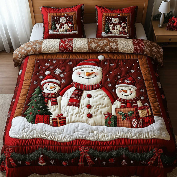 Snowy Companions quilted 3-piece bedding set on a made bed with two matching pillow shams