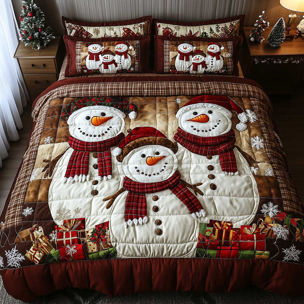 Snowy Companions quilted 3-piece bedding set on a made bed with two matching pillow shams