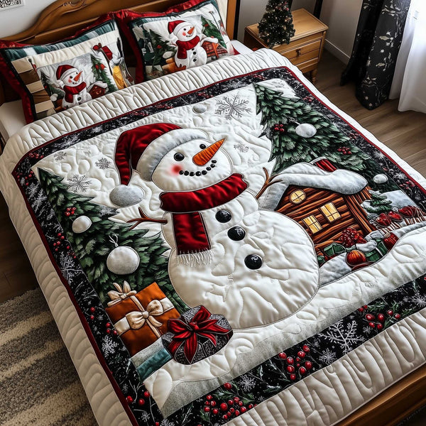 Snowy Companions quilted 3-piece bedding set on a made bed with two matching pillow shams