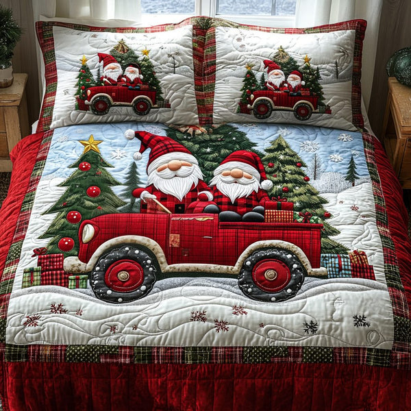 Snowy Companions quilted 3-piece bedding set on a made bed with two matching pillow shams