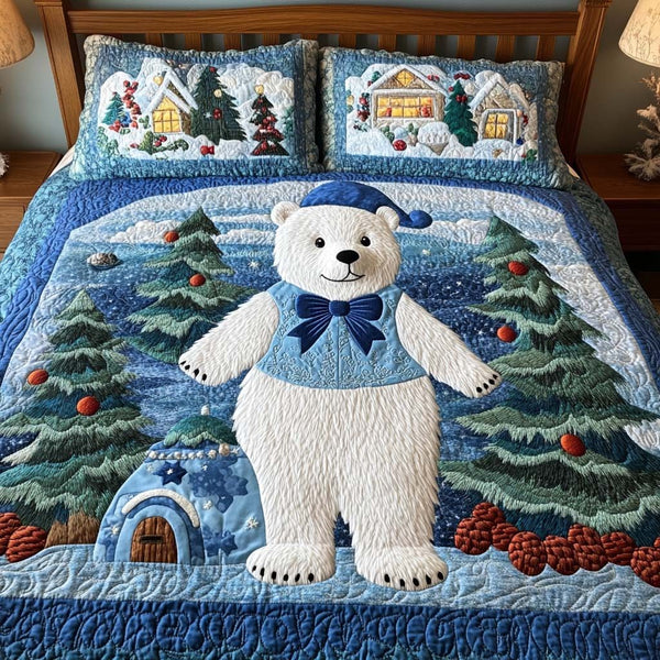 Snowy Delight quilted 3-piece bedding set on a made bed with two matching pillow shams