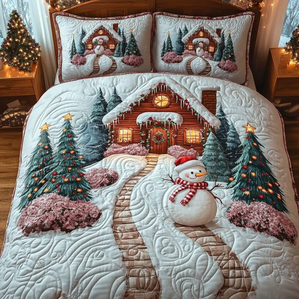 Snowy Haven quilted 3-piece bedding set on a made bed with two matching pillow shams