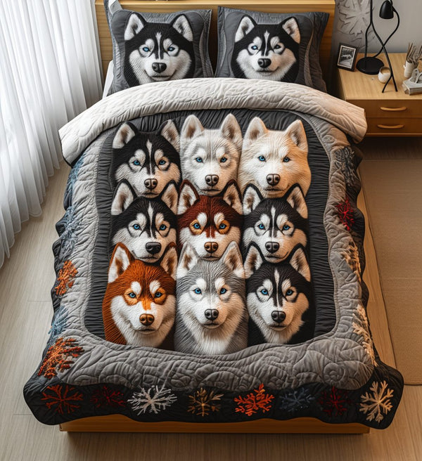 Snowy Paws quilted 3-piece bedding set on a made bed with two matching pillow shams