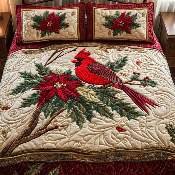 Snowy Perch quilted 3-piece bedding set on a made bed with two matching pillow shams