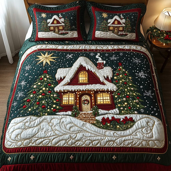 Snowy Retreat quilted 3-piece bedding set on a made bed with two matching pillow shams