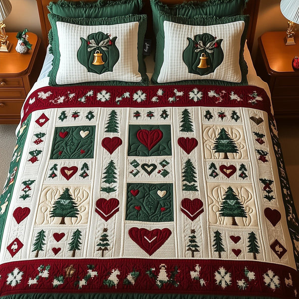 Snowy Serenade quilted 3-piece bedding set on a made bed with two matching pillow shams