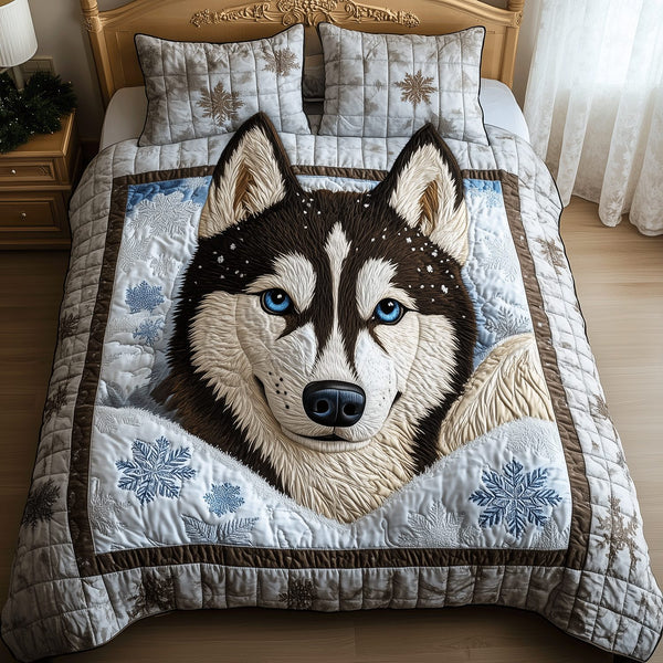 Snowy Siberian quilted 3-piece bedding set on a made bed with two matching pillow shams