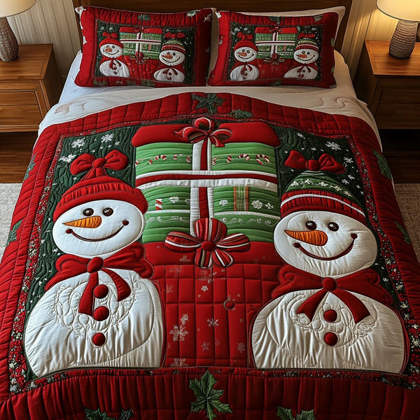 Snowy Smiles quilted 3-piece bedding set on a made bed with two matching pillow shams