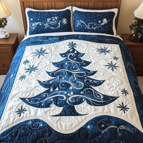 Snowy Tree quilted 3-piece bedding set on a made bed with two matching pillow shams