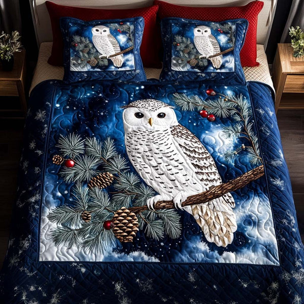Snowy Twilight quilted 3-piece bedding set on a made bed with two matching pillow shams