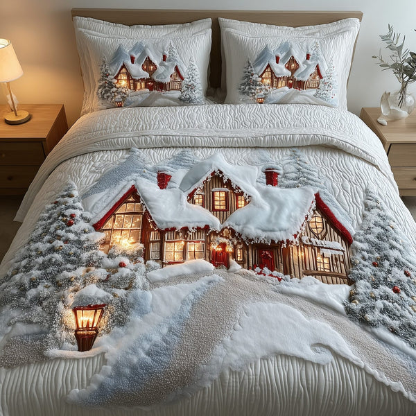 Snowy Village quilted 3-piece bedding set on a made bed with two matching pillow shams