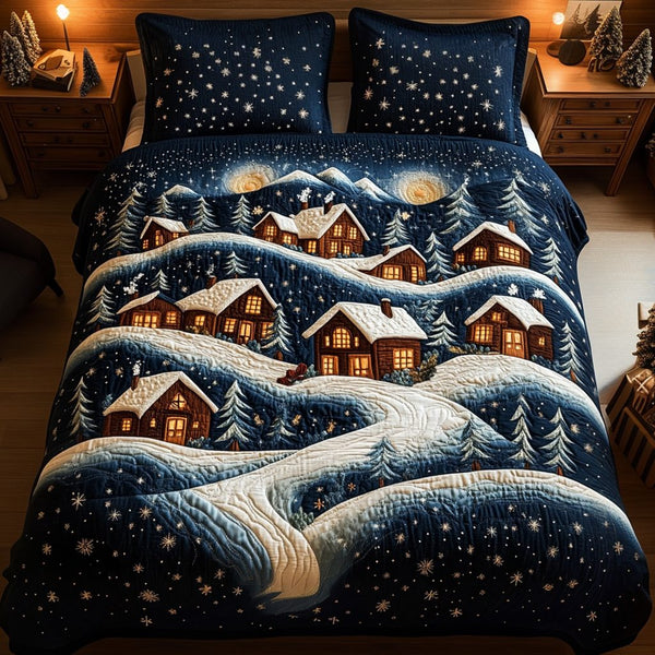 Snowy Village quilted 3-piece bedding set on a made bed with two matching pillow shams