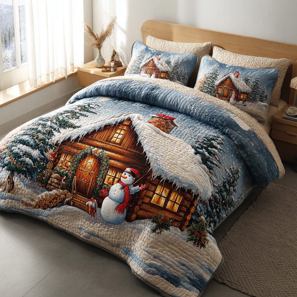 Snowy Welcome quilted 3-piece bedding set on a made bed with two matching pillow shams
