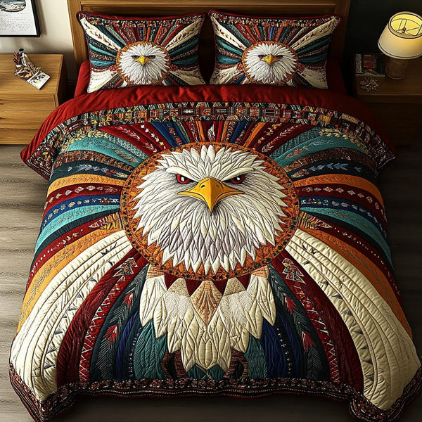 Soaring Freedom quilted 3-piece bedding set on a made bed in a warmly lit bedroom