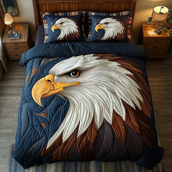 Soaring Majesty quilted 3-piece bedding set on a made bed with two matching pillow shams