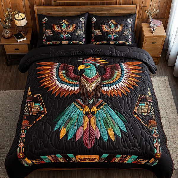 Soaring Spirit quilted 3-piece bedding set on a made bed with two matching pillow shams