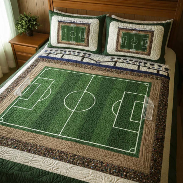 Soccer Field quilted 3-piece bedding set on a made bed with two matching pillow shams