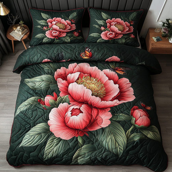 Soft Blossom quilted 3-piece bedding set on a made bed with two matching pillow shams