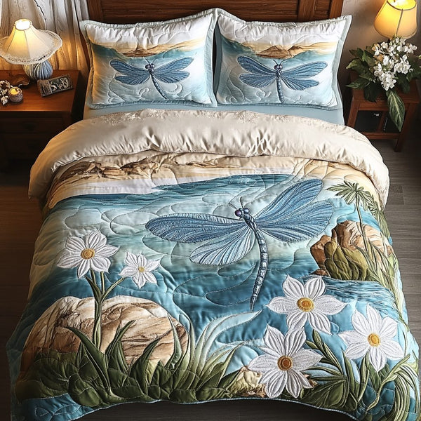 Soft Flight quilted 3-piece bedding set on a made bed with two matching pillow shams