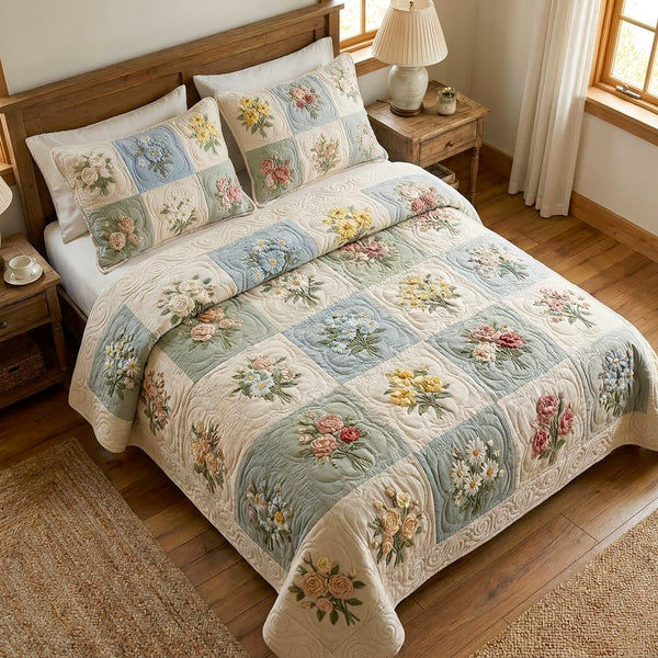 Soft Garden quilted 3-piece bedding set on a made bed with two matching pillow shams