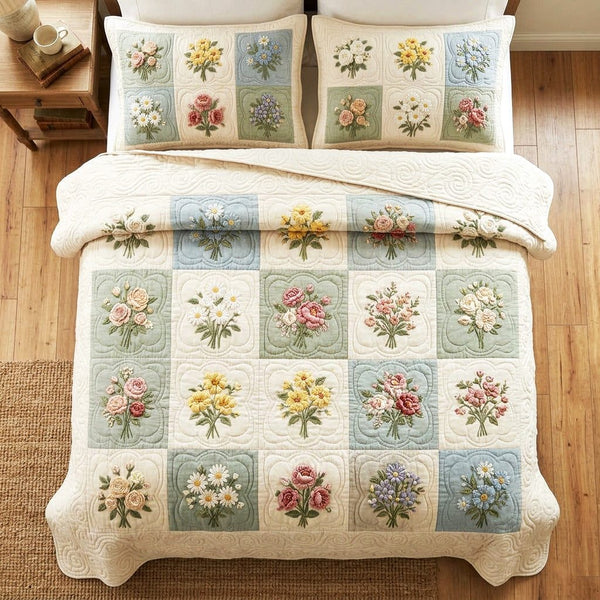 Soft Garden quilted 3-piece bedding set on a made bed with two matching pillow shams