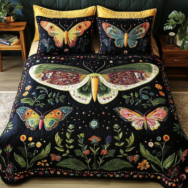 Soft Gleam quilted 3-piece bedding set on a made bed with two matching pillow shams