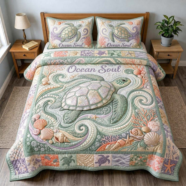 Soft Ocean Soul quilted 3-piece bedding set on a made bed in a light coastal bedroom