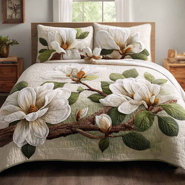 Soft Petals quilted 3-piece bedding set on a made bed with two matching pillow shams