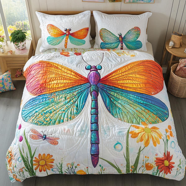 Soft Wings quilted 3-piece bedding set on a made bed with two matching pillow shams