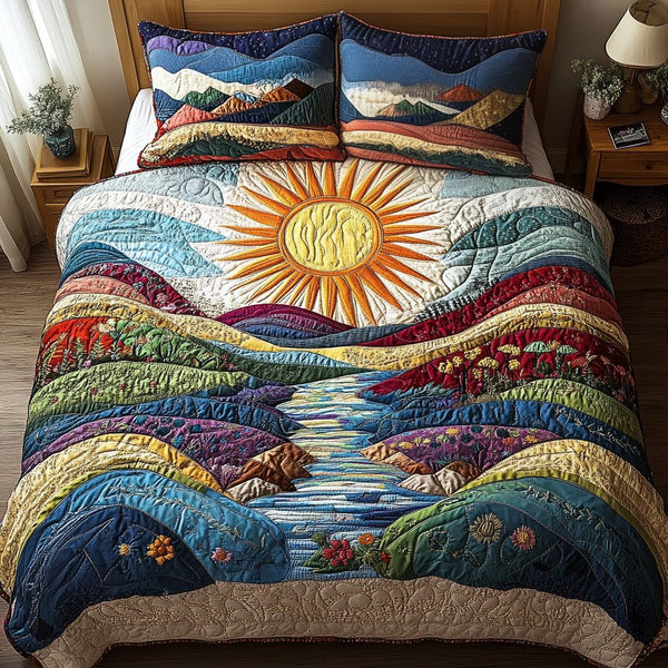 Solar Bliss quilted 3-piece bedding set on a made bed with two matching pillow shams