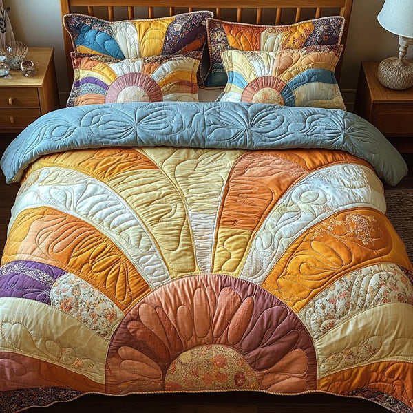 Solar Bliss quilted 3-piece bedding set on a made bed with two matching pillow shams