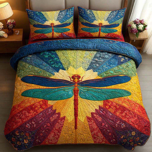 Solar Dragonfly quilted 3-piece bedding set on a made bed with two matching pillow shams