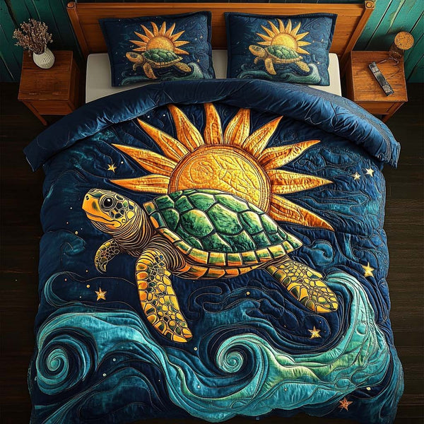 Solar Drift quilted 3-piece bedding set on a made bed with two matching pillow shams