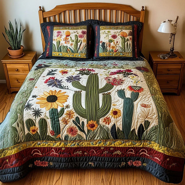 Southwest Essence quilted 3-piece bedding set on a made bed with two matching pillow shams
