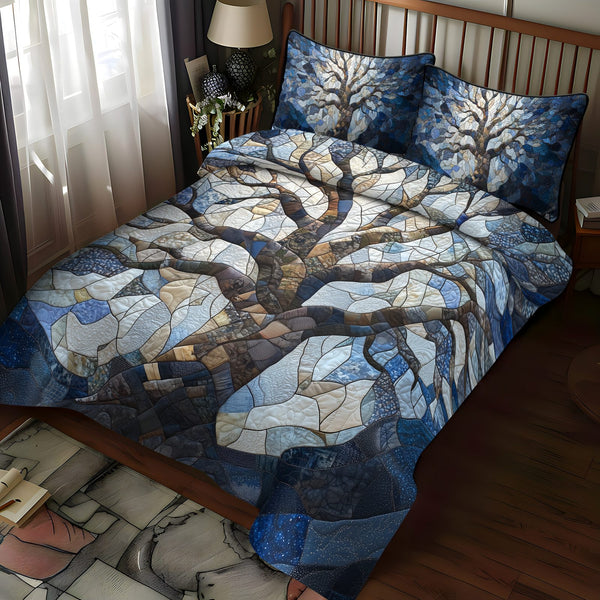 Spectrum Tree quilted 3-piece bedding set on a made bed with two matching pillow shams