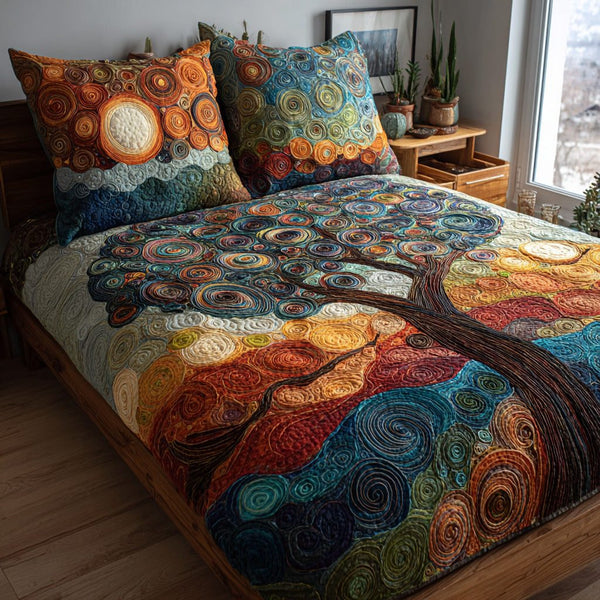 Spiral Canopy quilted 3-piece bedding set on a made bed with two matching pillow shams