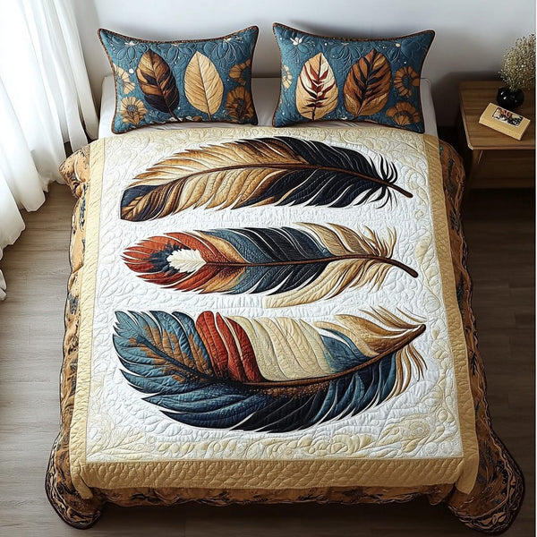 Spirit Feather quilted 3-piece bedding set on a made bed with two matching pillow shams