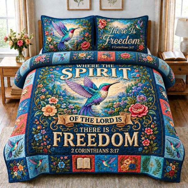 Spirit Freedom Garden quilted 3-piece bedding set on a made bed in a warmly lit bedroom