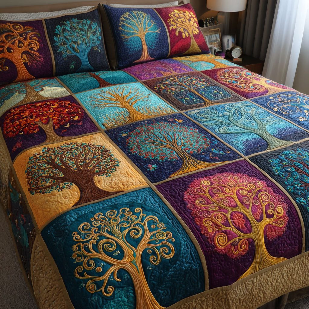 Spirit Grove quilted 3-piece bedding set on a made bed with two matching pillow shams