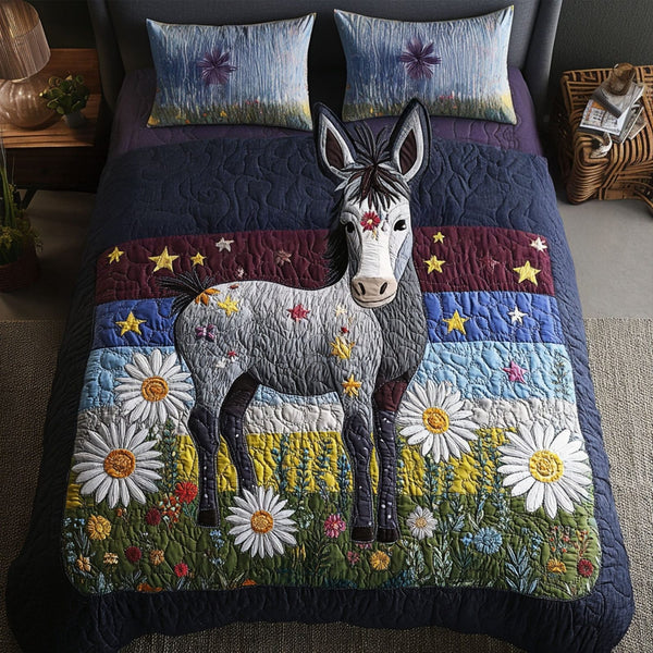 Spirit of Independence quilted 3-piece bedding set on a made bed in a warmly lit bedroom