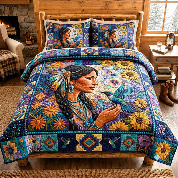 Spirit Woman quilted 3-piece bedding set on a made bed with two matching pillow shams