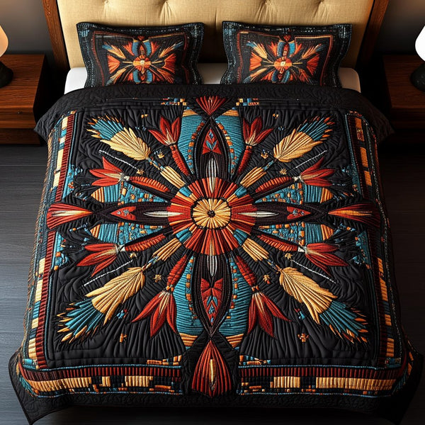 Spirits Soaring quilted 3-piece bedding set on a made bed with two matching pillow shams