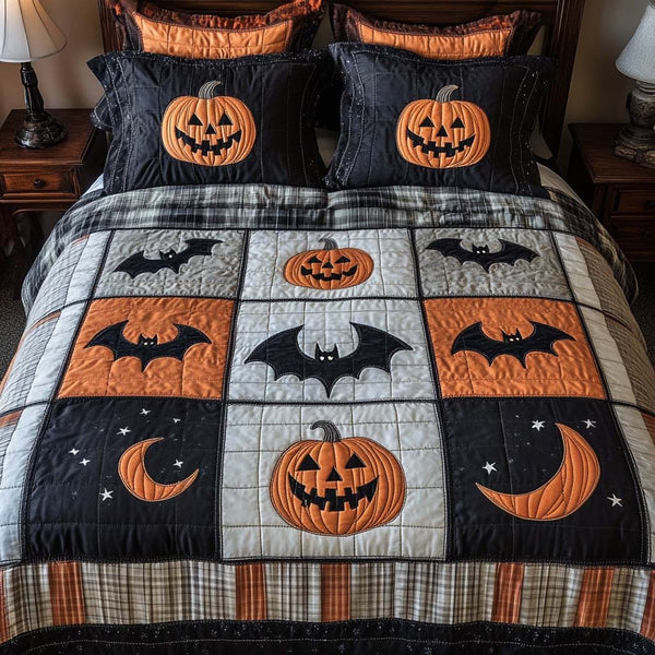 Spooky Bats quilted 3-piece bedding set on a made bed against a dark styled interior